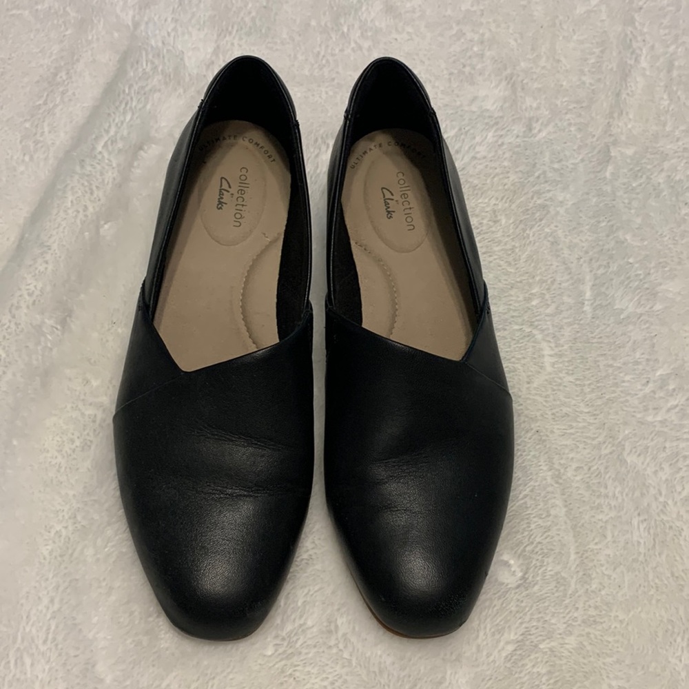 Clarks black loafer.